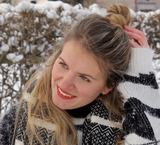 Black and White. Fashion Blogger Girl by Style Blog Heartfelt Hunt. Girl with blond half-up half-down bun wearing a black and white sweater, wool coat, culotte pants, black and white scarf and shiny boots.