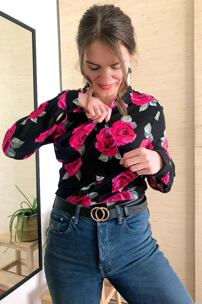 Blouse Fashion Hack. Fashion Blogger Girl by Style Blog Heartfelt Hunt. Girl with blond ponytail and pink scrunchie wearing a floral blouse, earrings, mom jeans and belt.