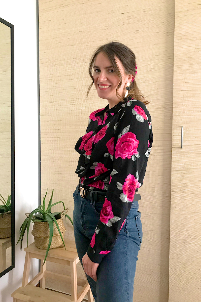 Blouse Fashion Hack. Fashion Blogger Girl by Style Blog Heartfelt Hunt. Girl with blond ponytail and pink scrunchie wearing a floral blouse, earrings, mom jeans and belt.