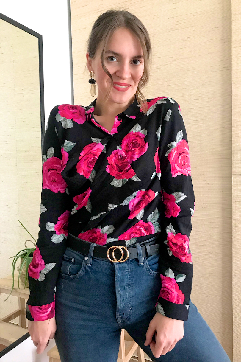 Blouse Fashion Hack. Fashion and Style Blog Girl from Heartfelt Hunt. Girl with blond ponytail and pink scrunchie wearing a floral blouse, earrings, mom jeans and belt.