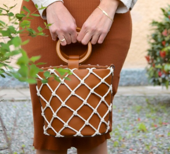 Bucket Bag. Fashion Blogger Girl by Style Blog Heartfelt Hunt. Girl with blond hair and pearl hair clips wearing a bucket bag, knitted dress, sweater and flats.