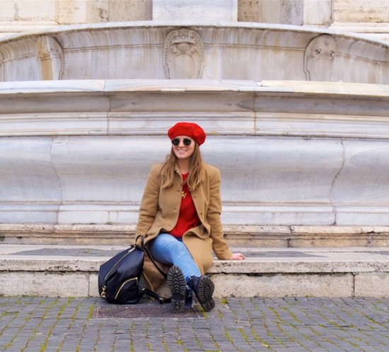 Camel Red. Fashion Blogger Girl by Style Blog Heartfelt Hunt. Girl with blond hair wearing a red beret, red sweater, camel coat, mom jeans, Rebecca Minkof backpack and chelsea boots.