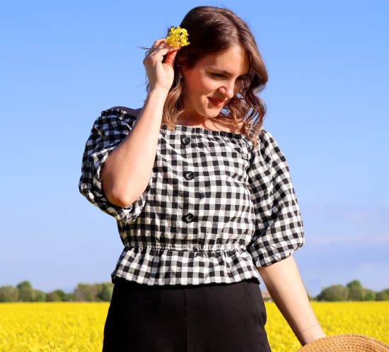 Canola Love. Fashion Blogger Girl by Style Blog Heartfelt Hunt. Girl with blond beach waves wearing an off-shoulder gingham blouse, black culotte, straw hat and straw bag.
