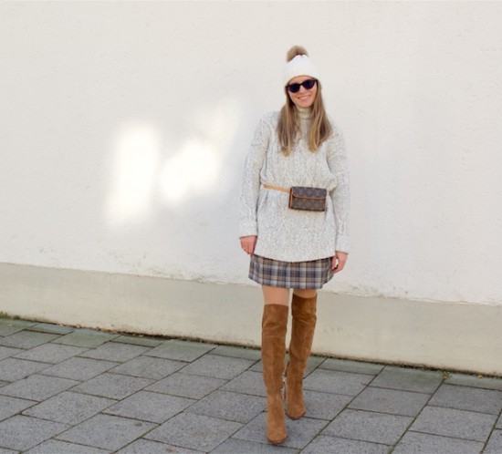 Check Lover. Fashion Blogger Girl by Style Blog Heartfelt Hunt. Girl with blond hair wearing a checked dress, chunky sweater, slim sunglasses, beanie with pompom, vintage Louis Vuitton belt bag and over the knee boots.