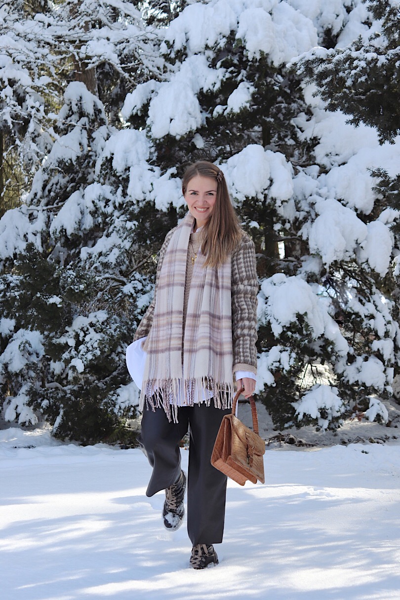 Double Plaid. Fashion Blogger Girl by Style Blog Heartfelt Hunt. Girl with blond hair wearing a plaid scarf, plaid blazer, long blouse, sweater, leather culottes, purse and boots.