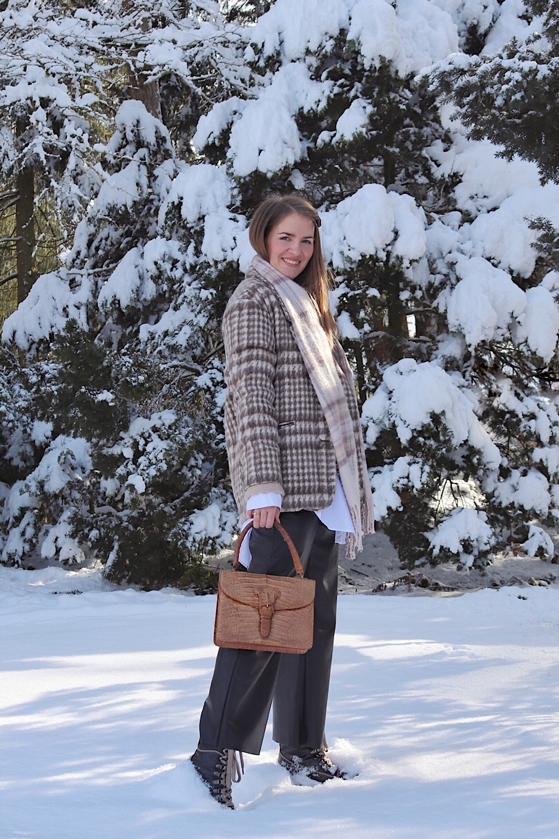 Double Plaid. Fashion and Style Blog Girl from Heartfelt Hunt. Girl with blonde hair wearing a plaid scarf, plaid blazer, long blouse, sweater, leather culottes, purse and boots.