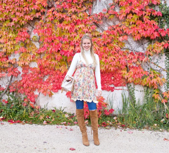 Fall Transition. Fashion Blogger Girl by Style Blog Heartfelt Hunt. Girl with blond half-up half-down knot wearing a flower dress, turtleneck, destroyed jeans, Louis Vuitton bag and over the knee boots.