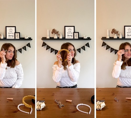 Favorite Fall Hair Accessories. Fashion Blogger Girl by Style Blog Heartfelt Hunt. Girl with blond hair wearing an off-shoulder blouse, mom jeans and a black belt showing her favorite fall hair accessories: Pearl headband, colorful tortoiseshell hair clips, leopard scrunchie, black padded headband, satin scrunchie, tortoiseshell hair clips and braided headband.
