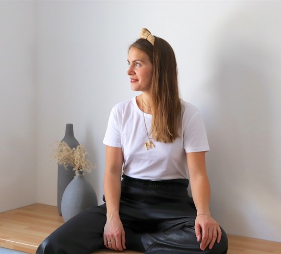 Headband Hairstyle. Fashion Blogger Girl by Style Blog Heartfelt Hunt. Girl with blond hair and straw headband wearing a white t-shirt and leather culottes.
