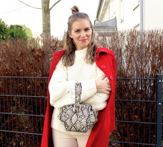 Holiday Season Whites. Fashion Blogger Girl by Style Blog Heartfelt Hunt. Girl with blond half-up half-down messy bun wearing an off-white chunky sweater, off-white corduroy pants, red coat, snake print bag and black sock boots.