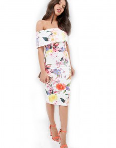 Girl wearing a shoulder-free floral bodycon dress