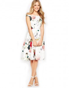 Girl wearing a shoulder-free floral dress