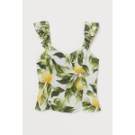 Lemon Print. Fashion and Style Blog Girl from Heartfelt Hunt showing her look with a lemon print top.