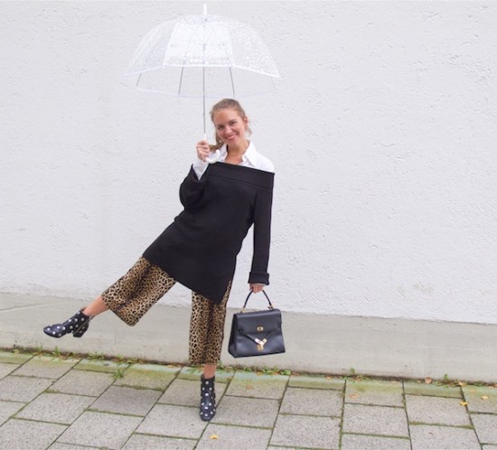 Leopard Culottes. Fashion Blogger Girl by Style Blog Heartfelt Hunt. Girl with blond ponytail wearing leopard culottes, blouse, off shoulder sweater, vintage MCM bag, umbrella and studded boots.