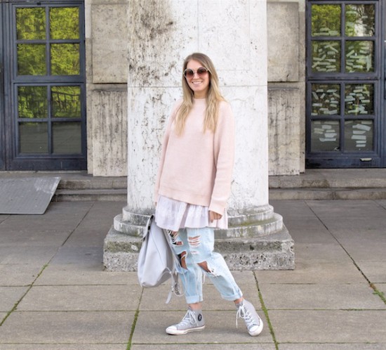 Light Pink Layers. Fashion Blogger Girl by Style Blog Heartfelt Hunt. Girl with blond hair wearing a light pink sweater, dress, destroyed jeans, gray backpack and Converse sneakers.