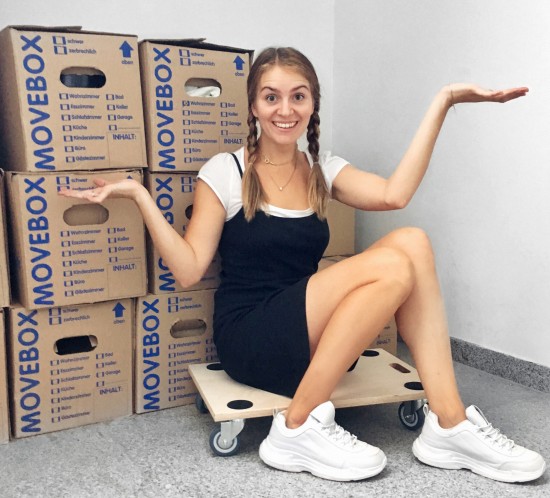 Moving Day. Fashion Blogger Girl by Style Blog Heartfelt Hunt. Girl with blond braids wearing a t-shirt, slip dress and chunky sneakers.