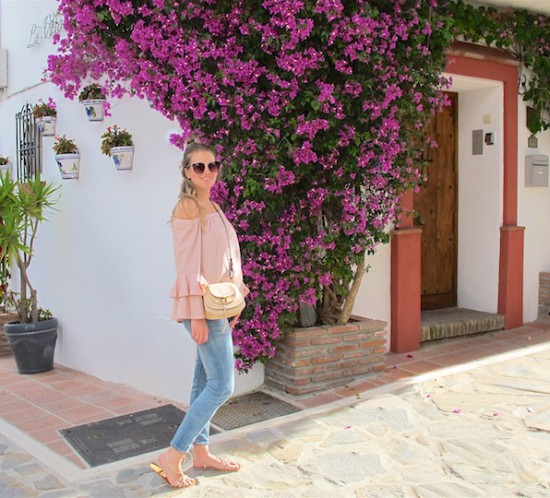Nude Blouse With Ruffled Sleeves. Fashion Blogger Girl by Style Blog Heartfelt Hunt. Girl with blond half-up half-down bun wearing a nude off-shoulder blouse with ruffled sleeves, jeans, cat eye sunglasses, See by Chloé bag and lace up sandals.