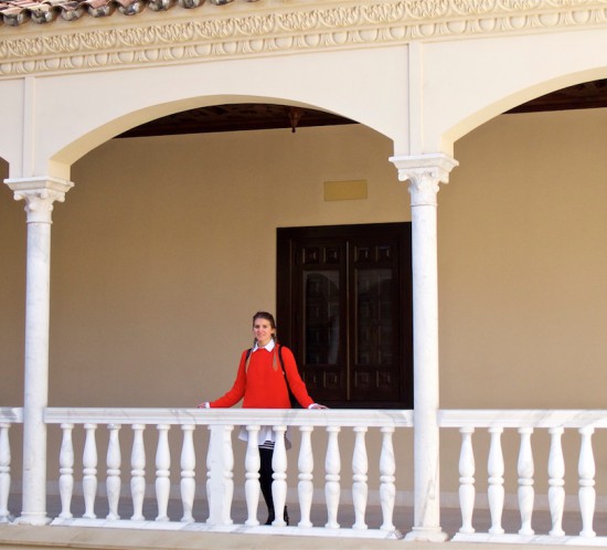 Picasso Museum. Fashion Blogger Girl by Style Blog Heartfelt Hunt. Girl with blond double dutch braids wearing a red sweater, long blouse, striped skirt, backpack and studded boots.
