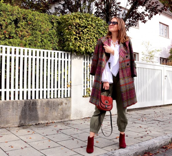 Plaid Coat. Fashion Blogger Girl by Style Blog Heartfelt Hunt. Girl with blond hair wearing a plaid coat, white blouse, cargo pants, Michael Kors bag and burgundy booties.
