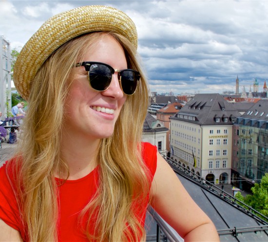 Red Dress. Fashion Blogger Girl by Style Blog Heartfelt Hunt. Girl with blond loose curls wearing a red dress, straw hat, Ray-Ban sunglasses and sandals.