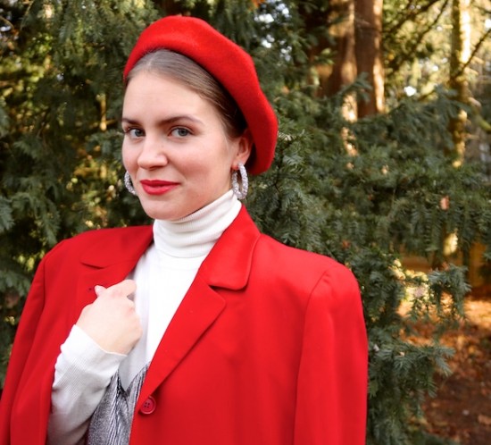 Red Silver. Fashion Blogger Girl by Style Blog Heartfelt Hunt. Girl with blond, low bun wearing a red blazer, silver slip dress, white turtleneck sweater, red beret, silver earrings, metallic clutch and metallic heels.