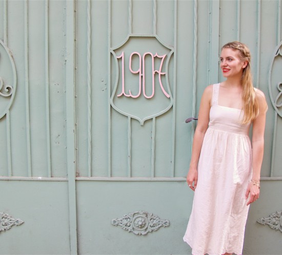 Romantic Pastel Colors. Fashion Blogger Girl by Style Blog Heartfelt Hunt. Girl with braided half-up half-down hairstyle wearing a romantic lace dress and sandals.