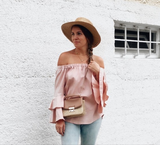 Straw Accessories. Fashion Blogger Girl by Style Blog Heartfelt Hunt. Girl with blond braid wearing a pink off shoulder blouse, destroyed jeans, straw hat, straw bag and straw shoes.