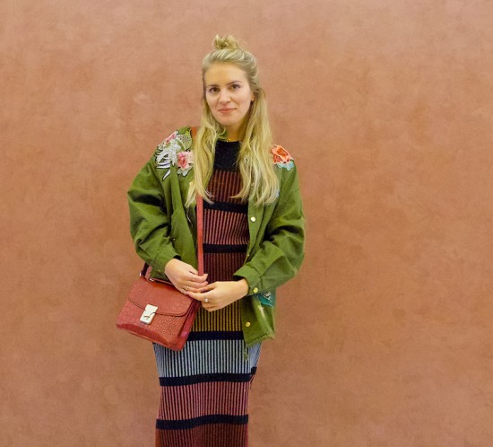 Stripes And Flowers. Fashion Blogger Girl by Style Blog Heartfelt Hunt. Girl with blond half-up half-down knot wearing a knitted dress with stripes, jacket with flowers, burgundy bag and burgundy brogues.