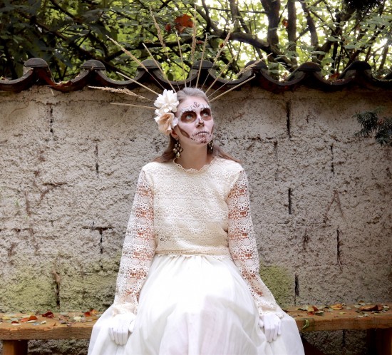 White Calavera Makeup. Fashion Blogger Girl by Style Blog Heartfelt Hunt. Girl with blond hair wearing a white lace top, tulle skirt and beige combat boots for her white calavera make-up.