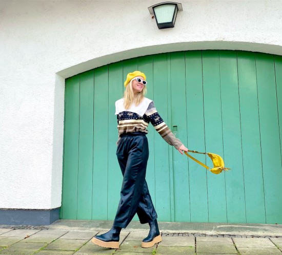 Yellow Beret. Fashion Blogger Girl by Style Blog Heartfelt Hunt. Girl with blond hair wearing a yellow beret, jacquard sweater, vintage collar, faux leather pants, yellow belt bag and chunky chelsea boots.